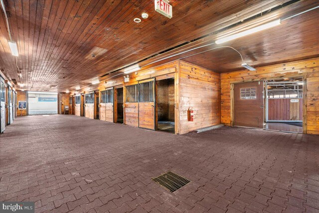 hallway featuring wooden ceiling