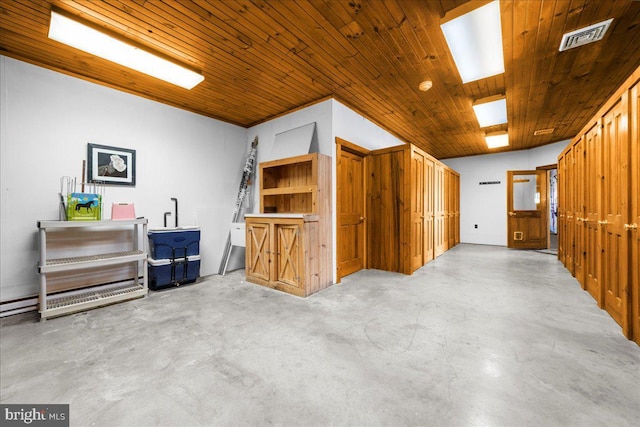 interior space with visible vents, wood ceiling, and concrete flooring