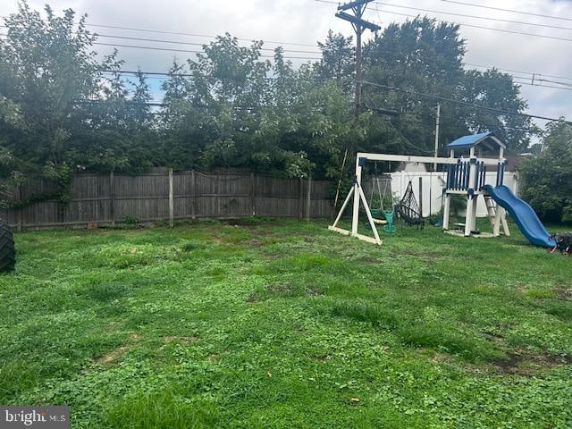 view of yard with a playground