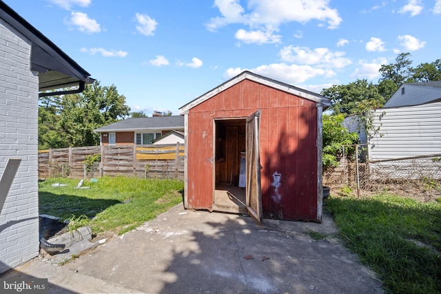 view of outdoor structure with a lawn