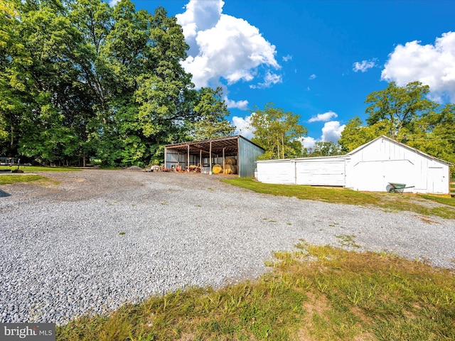 exterior space featuring an outbuilding