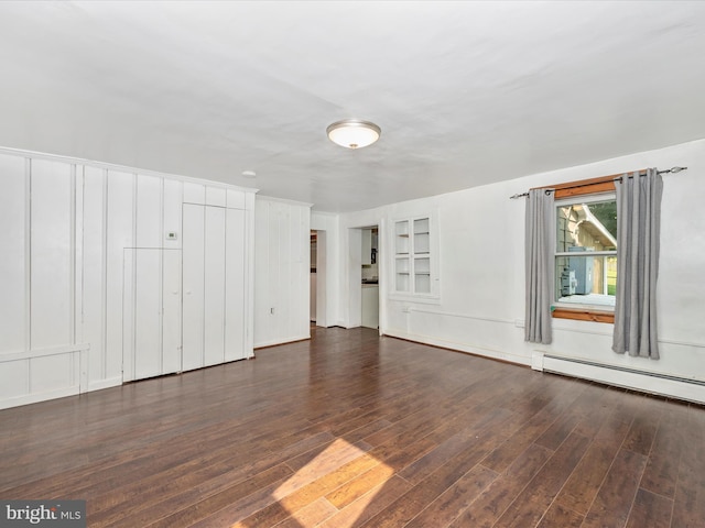 interior space featuring a baseboard radiator and dark hardwood / wood-style flooring