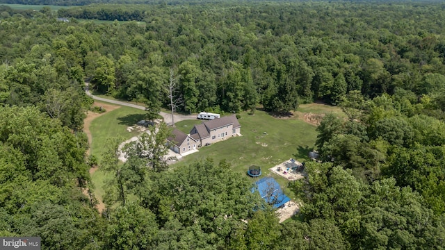 bird's eye view featuring a view of trees