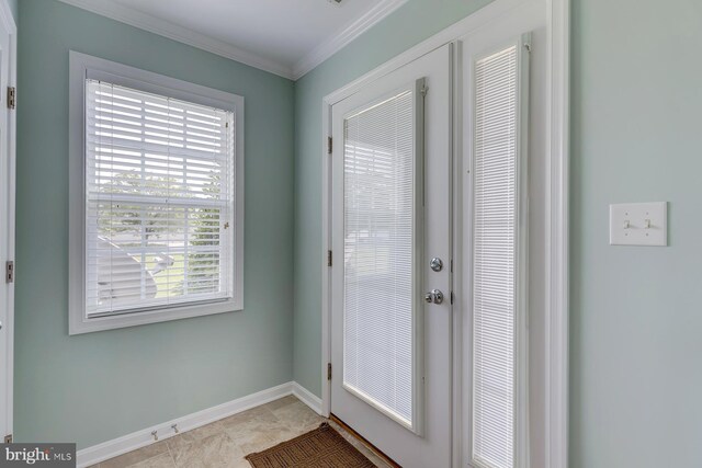 doorway to outside featuring crown molding and light tile patterned floors