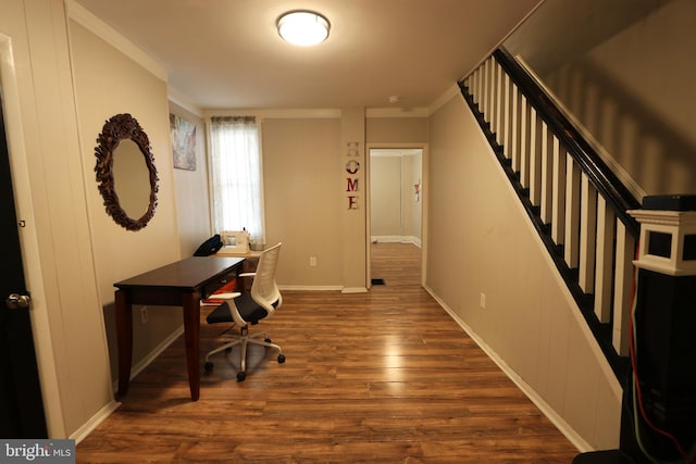 office space featuring ornamental molding and dark hardwood / wood-style flooring