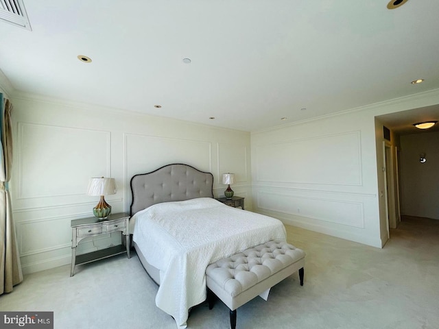 bedroom featuring light carpet