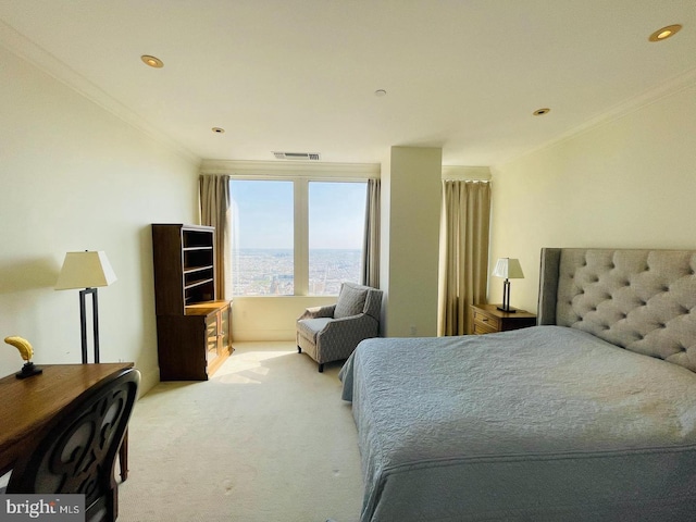 bedroom with crown molding and carpet