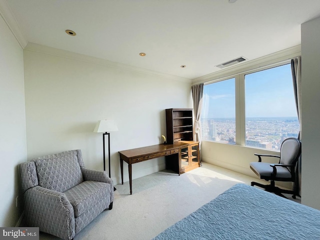 bedroom featuring crown molding and light carpet