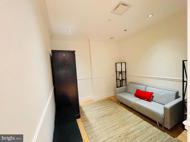 sitting room featuring hardwood / wood-style flooring