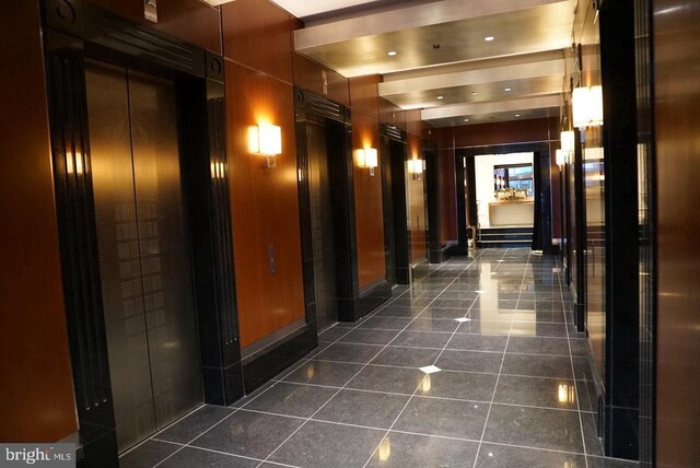 hallway featuring elevator