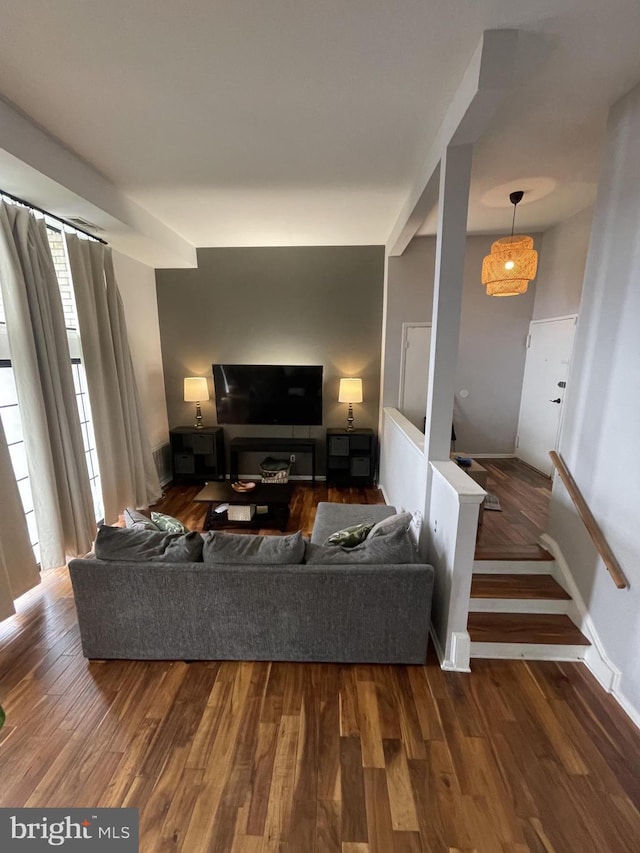 living room with dark wood-type flooring