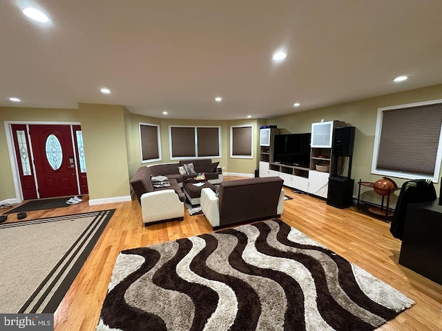 living room with light hardwood / wood-style flooring