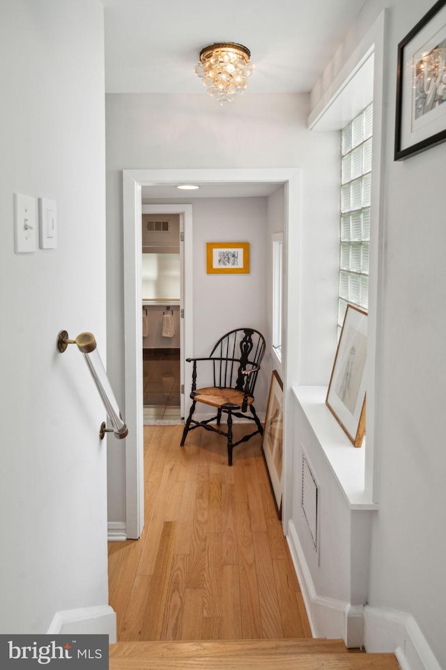 hallway featuring light wood-type flooring