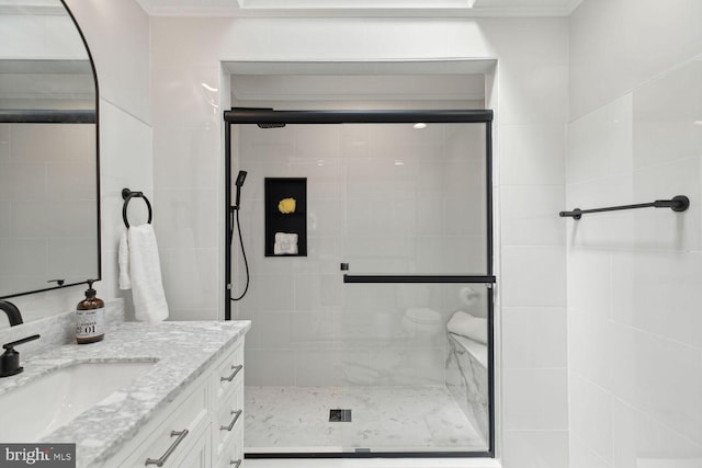 bathroom featuring a shower with door, toilet, crown molding, and vanity