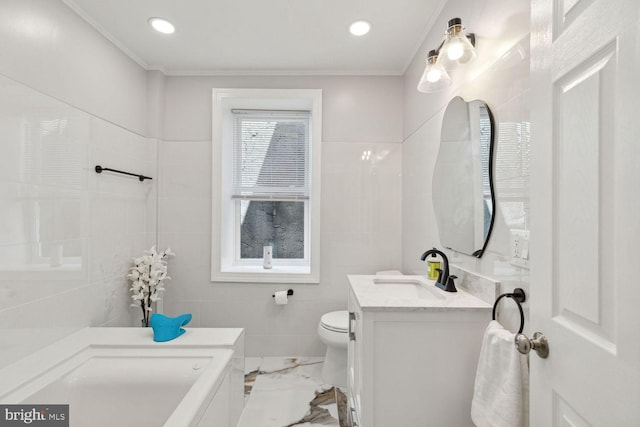 bathroom with toilet, ornamental molding, tile patterned flooring, and tile walls