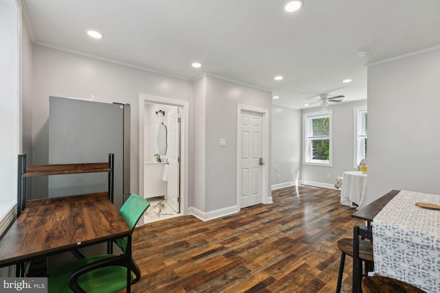 office area featuring ceiling fan, ornamental molding, and hardwood / wood-style flooring