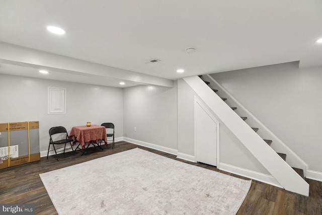 living area with dark hardwood / wood-style floors