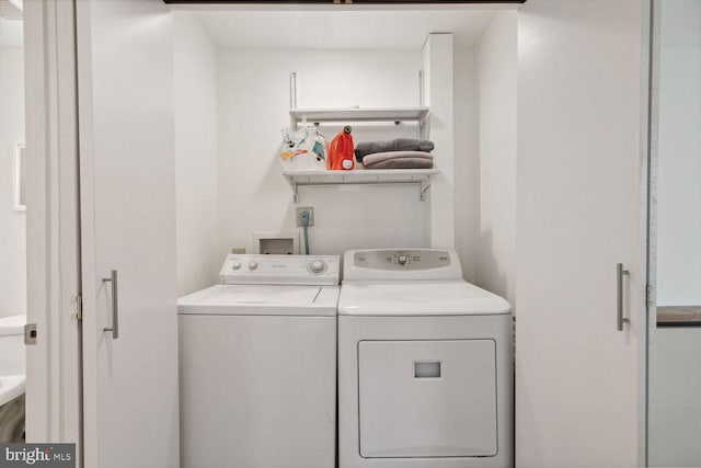 laundry area featuring washer and dryer