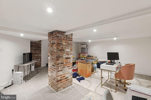 tiled home office with brick wall