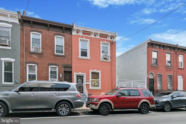 view of front of property featuring cooling unit