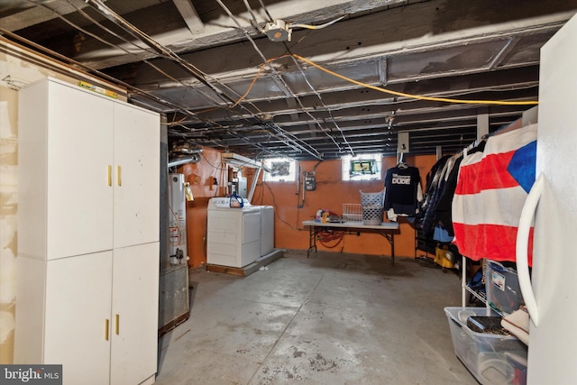 basement featuring washing machine and clothes dryer