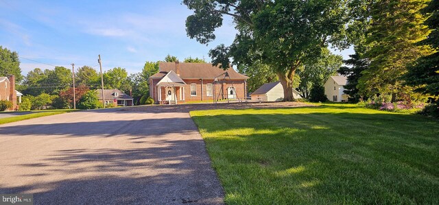 view of front of home with a front yard