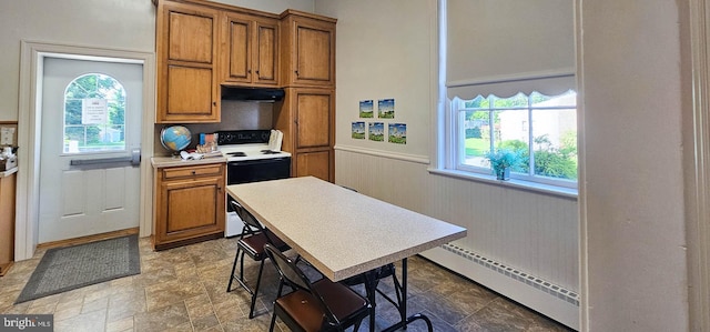 kitchen with a baseboard heating unit, exhaust hood, and white range with electric stovetop