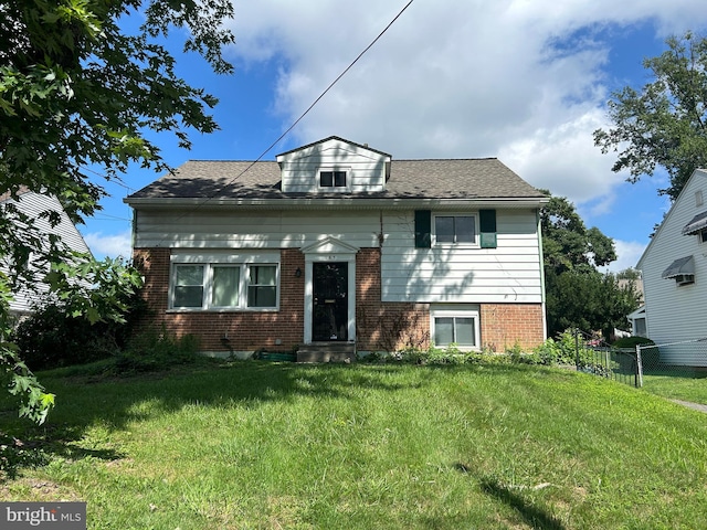 view of front of house with a front lawn