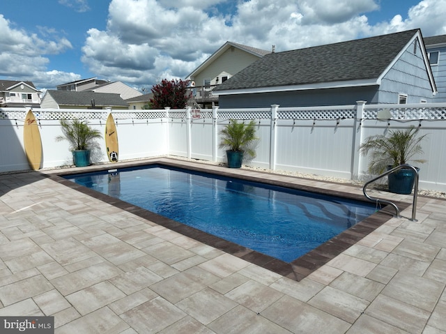 view of pool featuring a patio