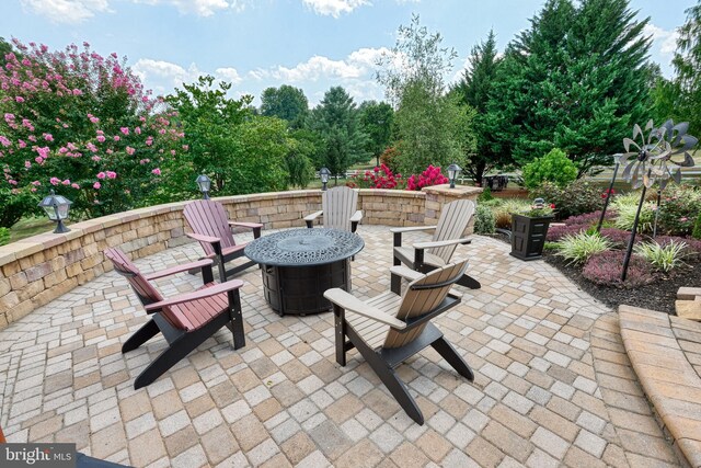 view of patio featuring a fire pit