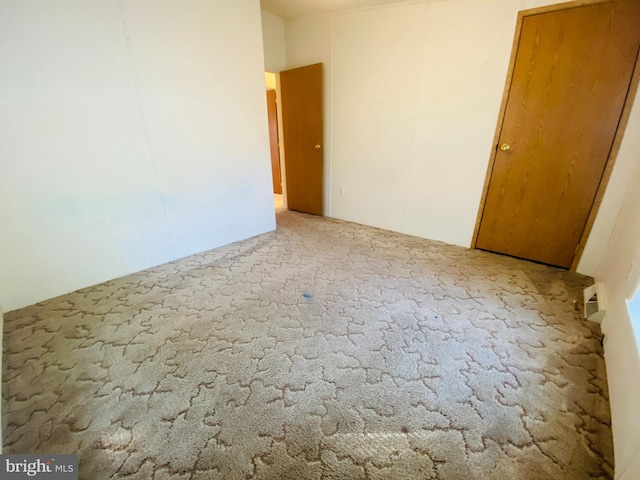 empty room featuring carpet