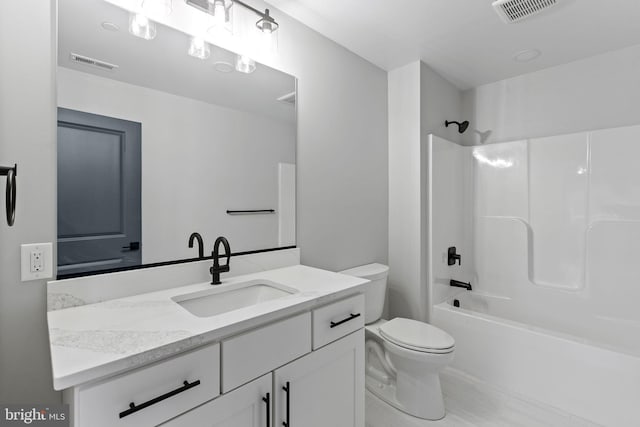 full bathroom with vanity, toilet, and tub / shower combination