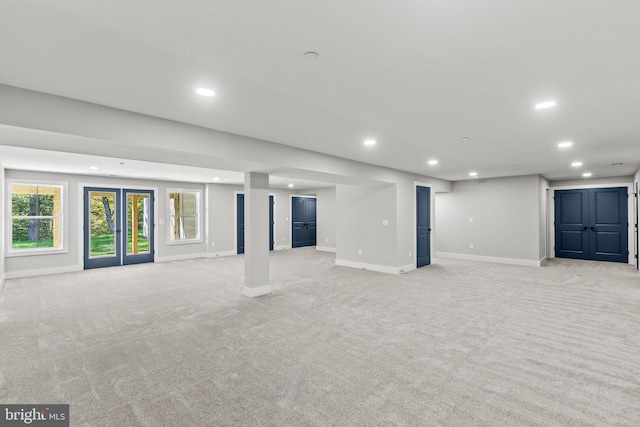 basement with light colored carpet