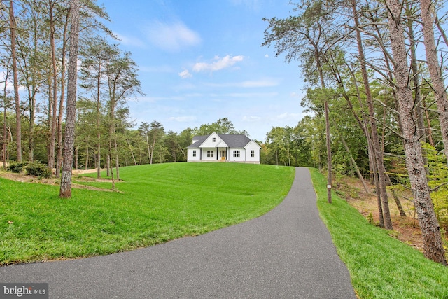 exterior space featuring a front yard