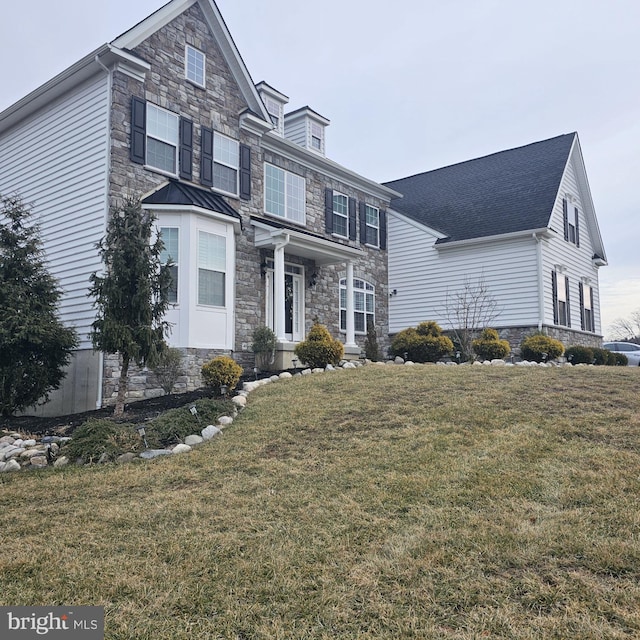 view of front of house with a front yard