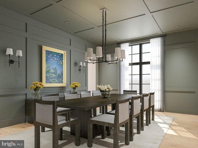 dining area with a chandelier and light wood-style flooring