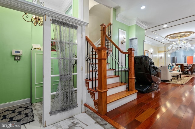 foyer entrance featuring stairs, baseboards, crown molding, and recessed lighting