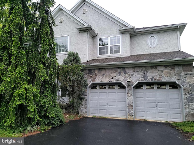 view of front of house with a garage