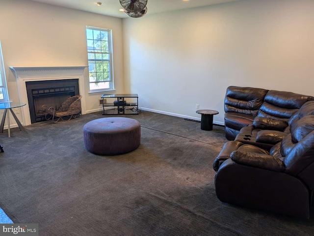 living room featuring dark carpet