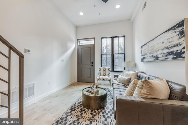 living room with light hardwood / wood-style floors