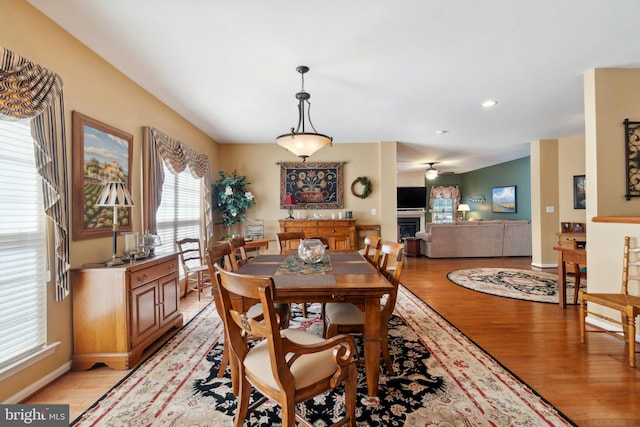 dining area featuring light wood-type flooring