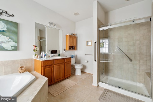 full bathroom featuring shower with separate bathtub, toilet, and vanity