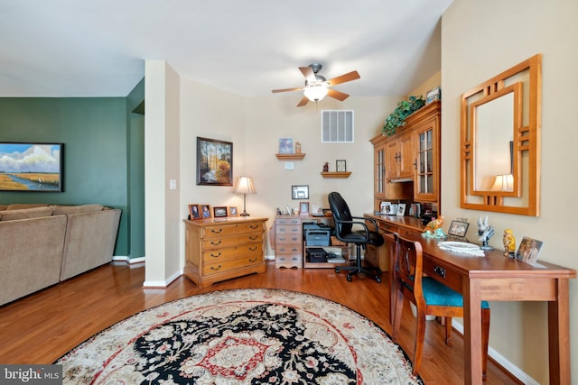 office featuring ceiling fan and wood-type flooring