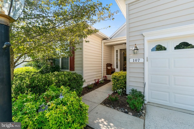 property entrance featuring a garage