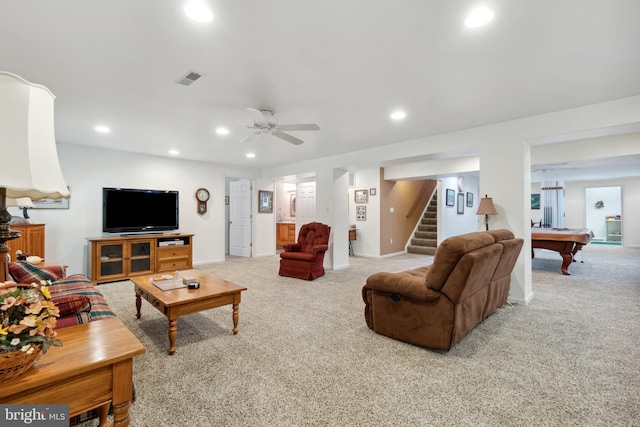 living room with ceiling fan, pool table, and light carpet