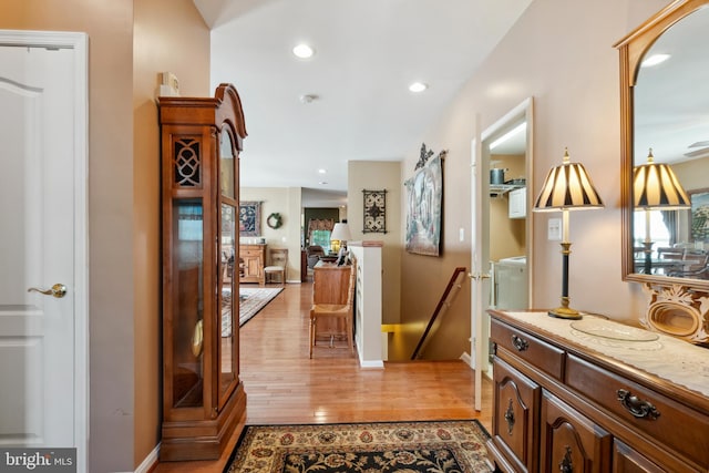 hallway featuring light wood-type flooring