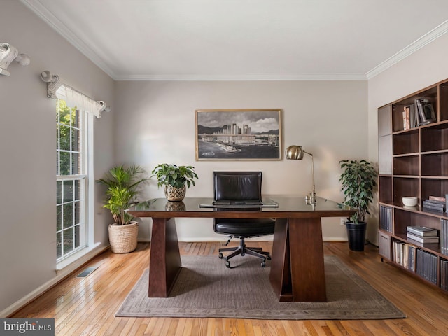 office area with ornamental molding and wood-type flooring