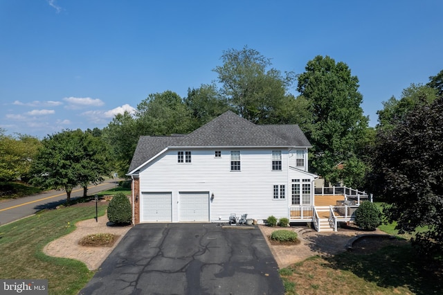 exterior space with a garage