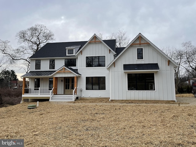 modern farmhouse style home with a porch