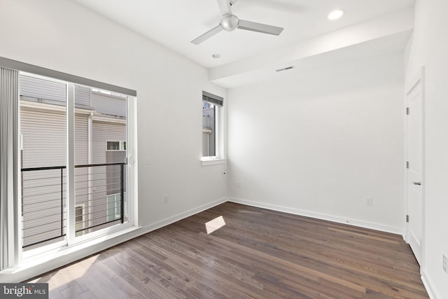 spare room featuring ceiling fan and hardwood / wood-style flooring